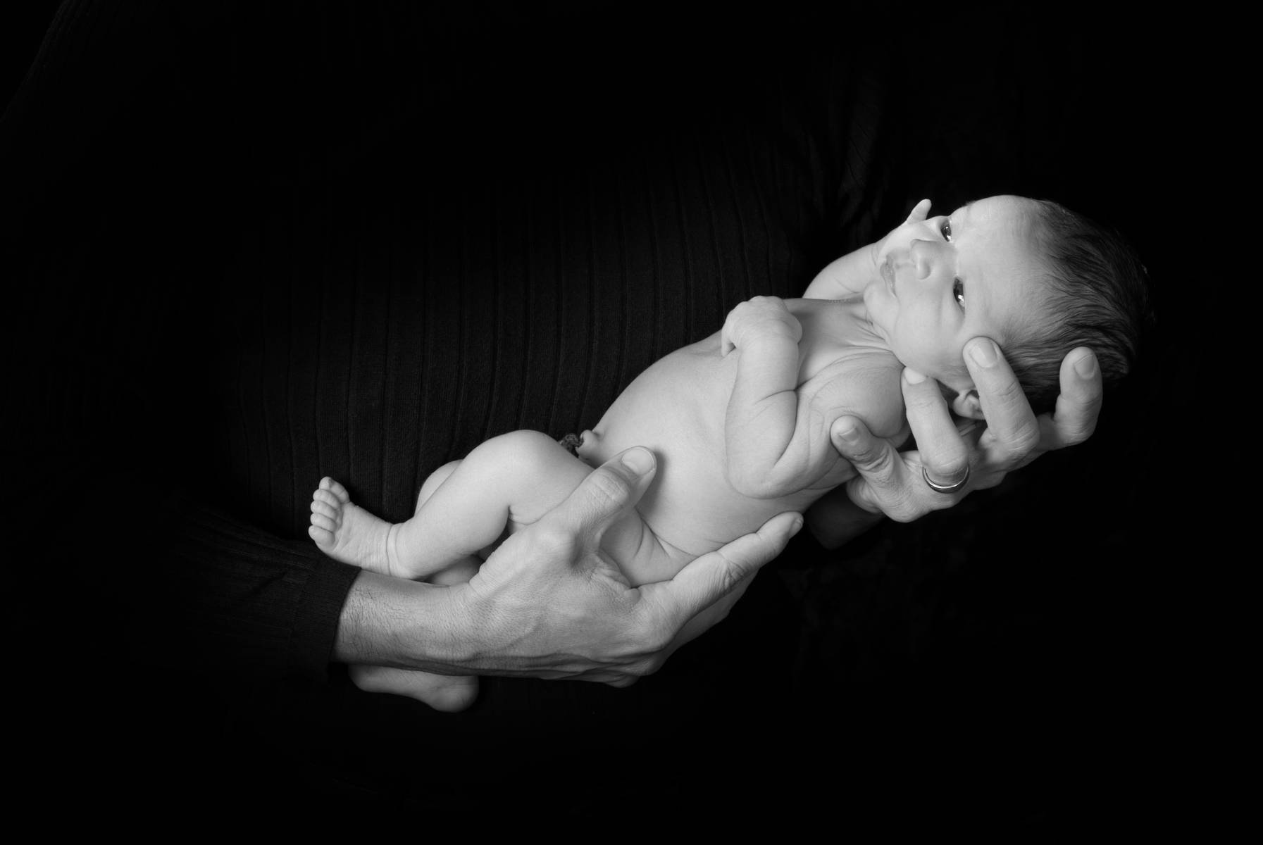 Black & White Portrait of Newborn Baby with Ambiblical Cord Attached by Robertsons' Warehouse Photography, Wichita, KS
