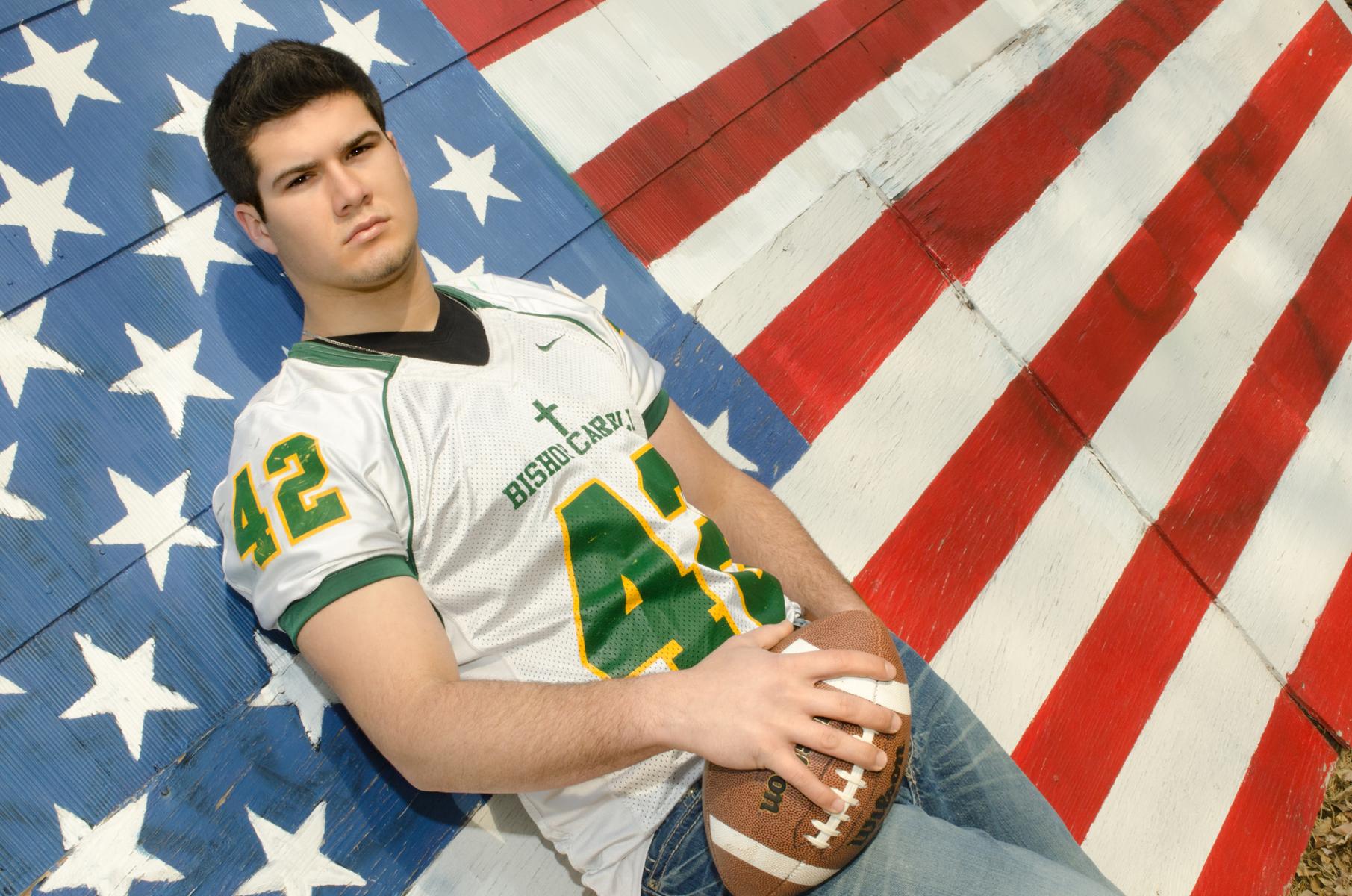Patriotic background, edgy posing by Robertsons' Warehouse Photography, Wichita, KS