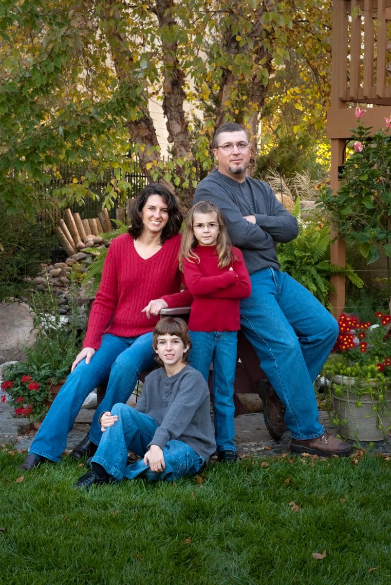 Family group sessions in the back yard is one of Robertsons' Warehouse Photography's most popular specials, Wichita, KS