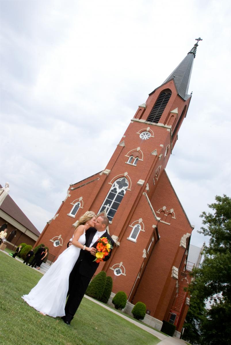 Their marriage sanctioned by their small town Catholic church, photo by Robertsons' Warehouse Photography, Wichita, KS