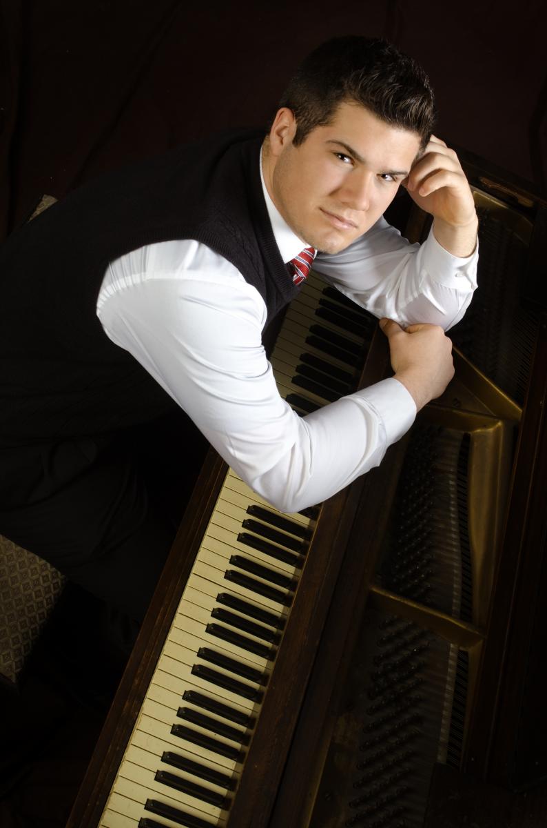 Doug Robertson, Master Photographer, created this sincere portrait of Patrick Dugan contemplating the art of music.